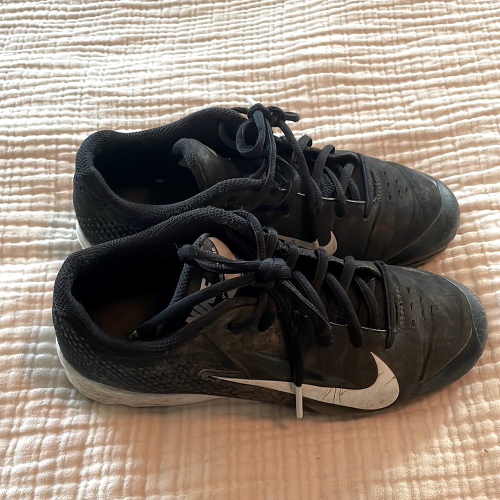 Size 4 kids cleats Nike